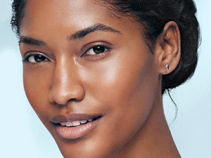 Why peptides? Model wearing Elizabeth Arden Hyaluronic Acid + Peptides Ceramide Water Cream