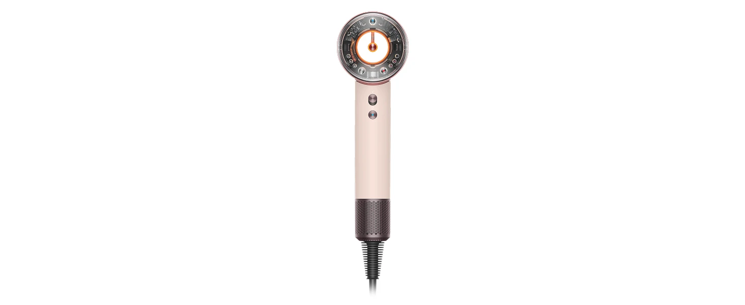 Dyson supersonic nural hair dryer in ceramic pink and rose gold on white background