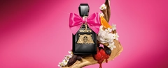 Juicy Couture Viva La Juicy Elixir perfume bottle with berries, flowers and tonka bean