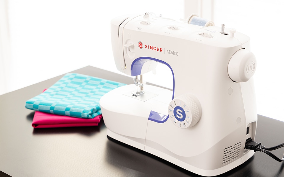 thumbnail video image 2 of SINGER® Super Bundle Special - M3400 Sewing Machine with Bonus 3-piece Presser Foot Kit, Packed with Specialty Accessories, Built-In Needle Threader, Easy-to-Use, Great for All Sewing Levels, 2 of 12