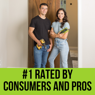 Man and woman holding stud finder near barn door