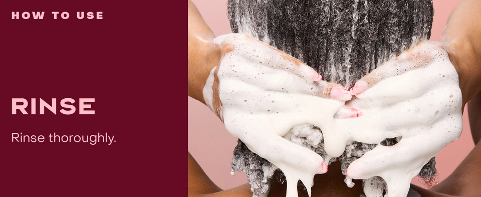 Close up shot of curly wet hair covered in conditioner being rinsed, next to rinsing instructions