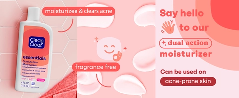 Bottle of Clean &amp; Clear Dual Action Moisturizer in pink bathroom with smiley next to product swatch