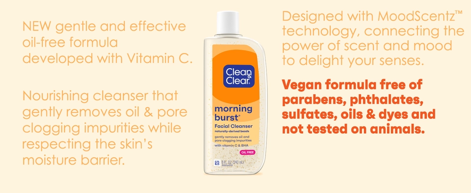 Bottle of Clean &amp; Clear Morning Burst Facial Cleanser on orange background