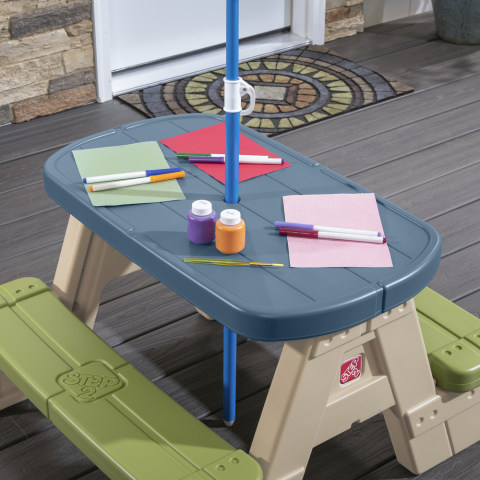 Step 2 Table folds flat Sit & Play Picnic Table with Umbrella 