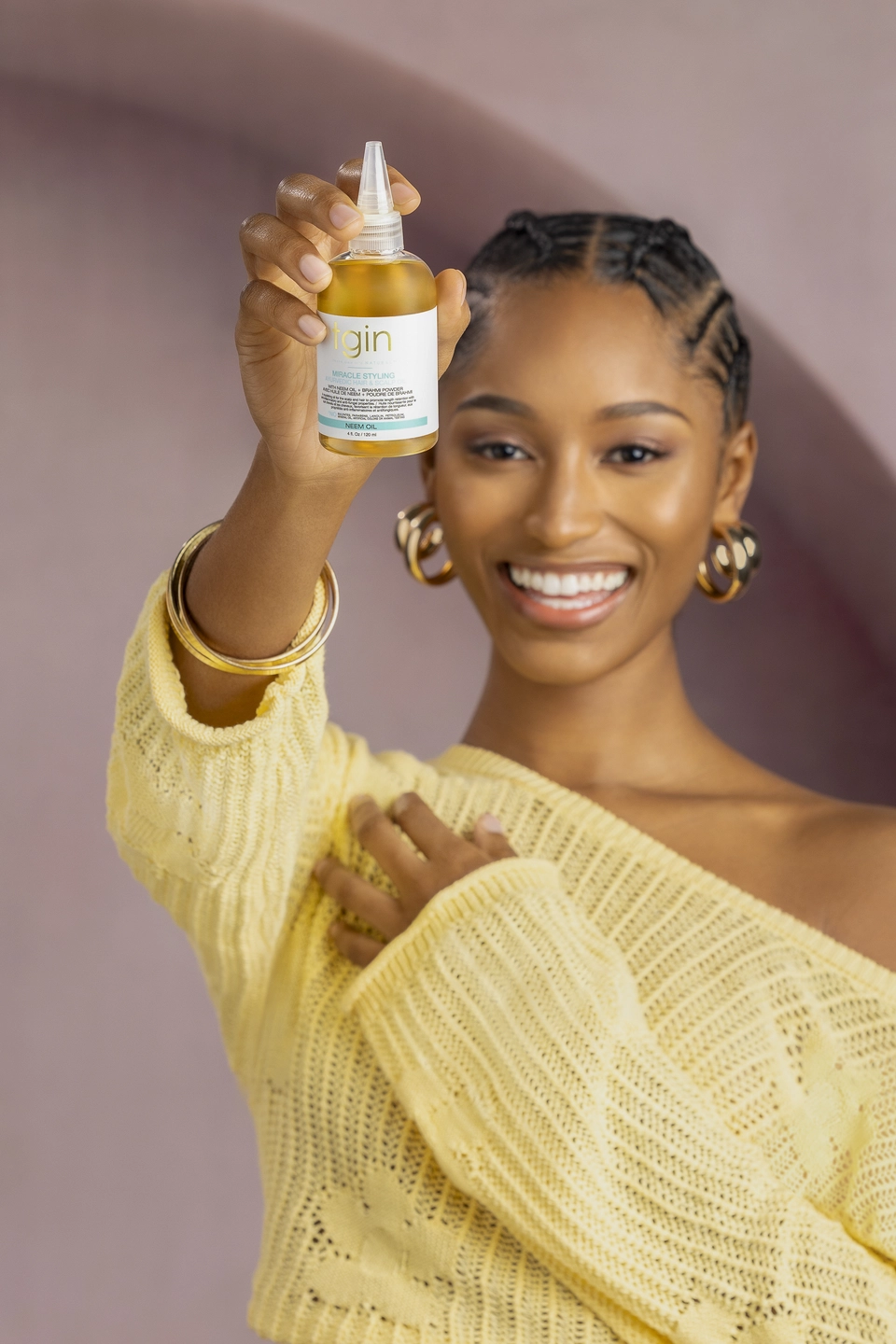 Model Holding Ayurvedic Hair &amp; Scalp Oil 