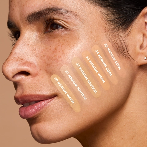 Soft Glam Satin Foundation medium shades on model
