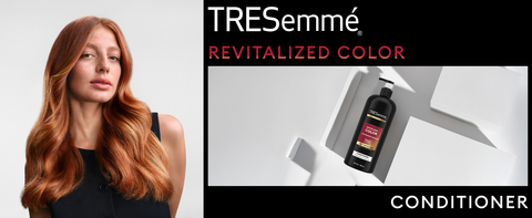 Red-haired model with silky waves beside a TRESemmé conditioner on a minimalist backdrop.