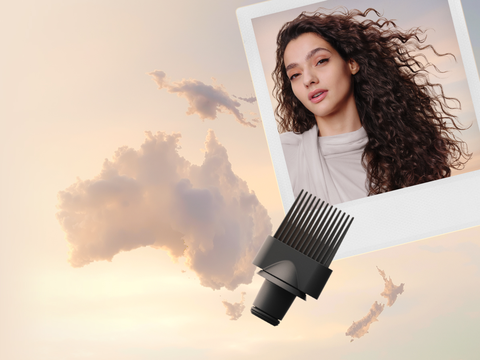 Clouds shaped like Australia, with a model and a Wide-tooth comb attachment.
