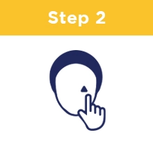 Step Two: A person applying a small triangle to their face