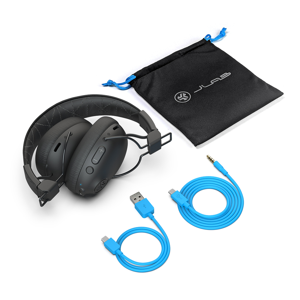 Folded Studio Pro ANC Wireless Over-Ear Headphones shown with included accessories: USB Type-C Charging Cable, 3.5mm AUX-IN Cable, and Travel Bag.