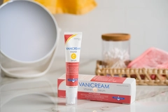 A tube and a carton of Vanicream Vitamin C serum lay on a counter.