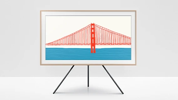 Product image of the Samsung Frame TV with a bridge painting displayed