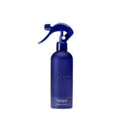Detangling Spray in blue bottle with nozzle
