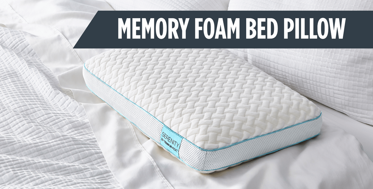 Text: Memory Foam Bed Pillow. Image: Pillow with cover lays on bed with white sheets.