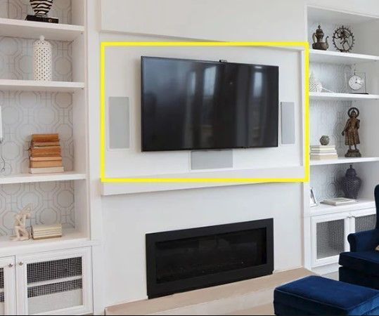 Flat screen TV mounted on a wall