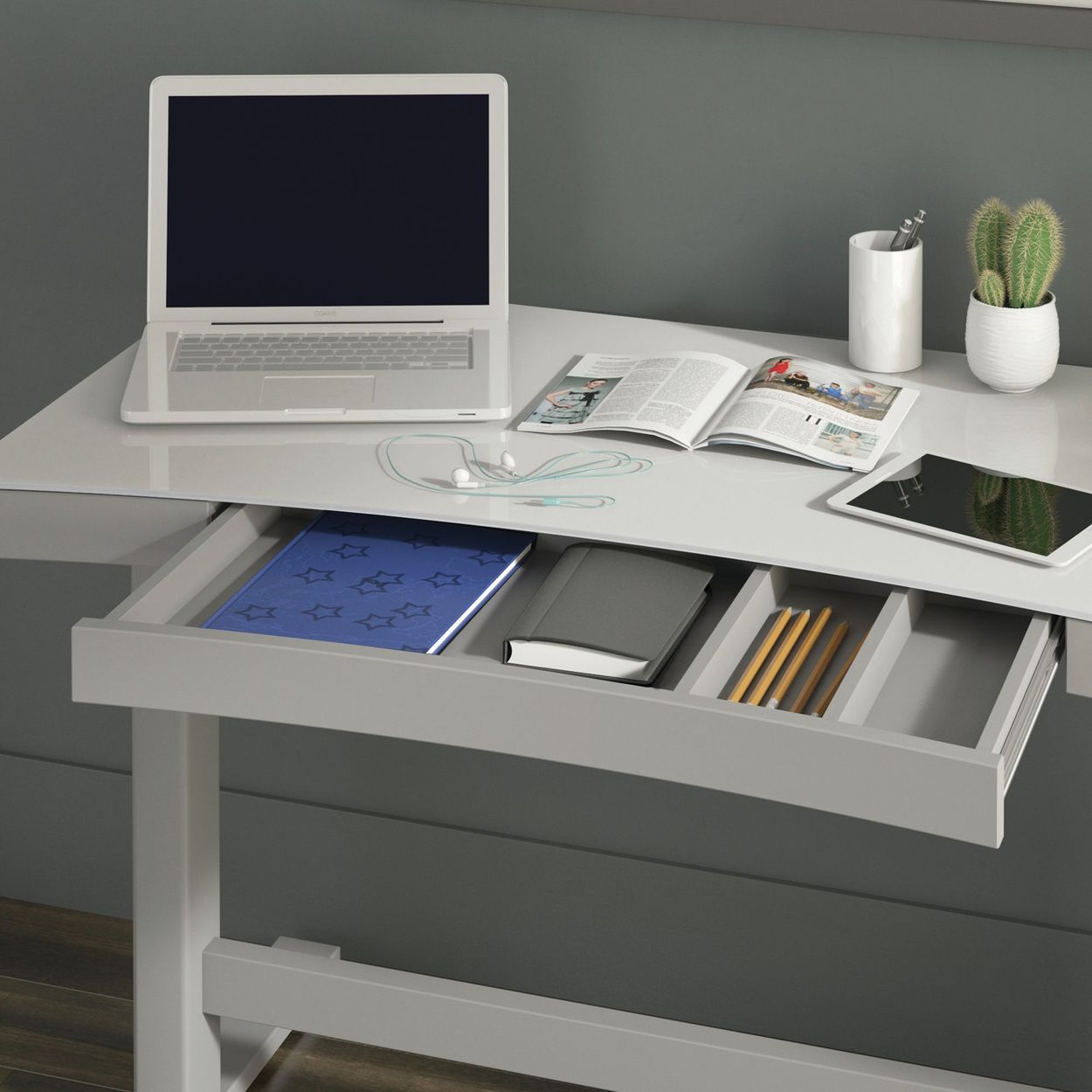 Laptop and office stuffs on the product